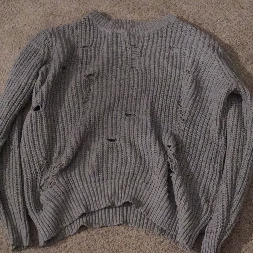 Naturally holy gray sweater.